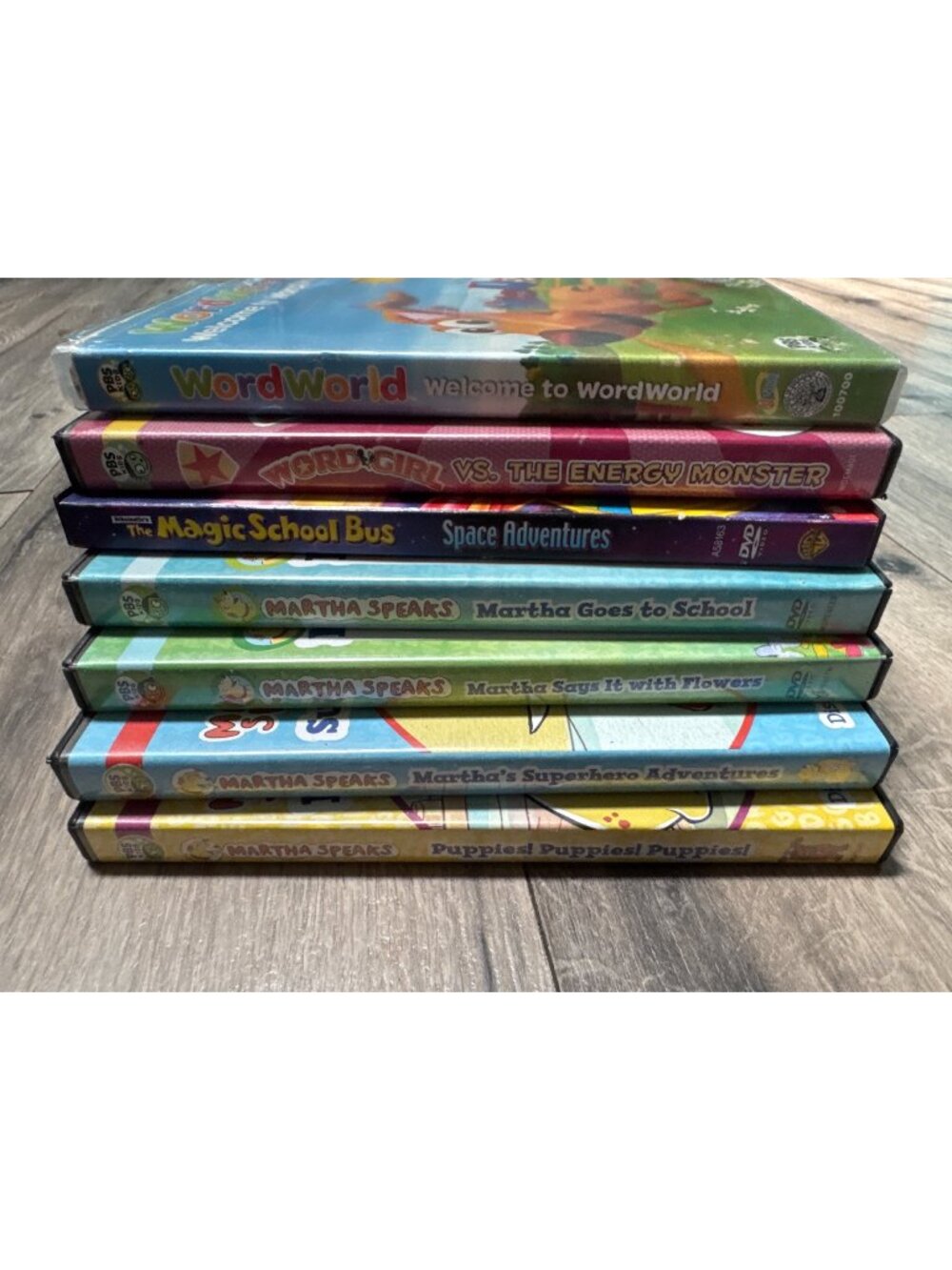 Set Of 7 PBS Kids DVDs Featuring WordWorld WordGirl Magic School Bus & Martha Sp